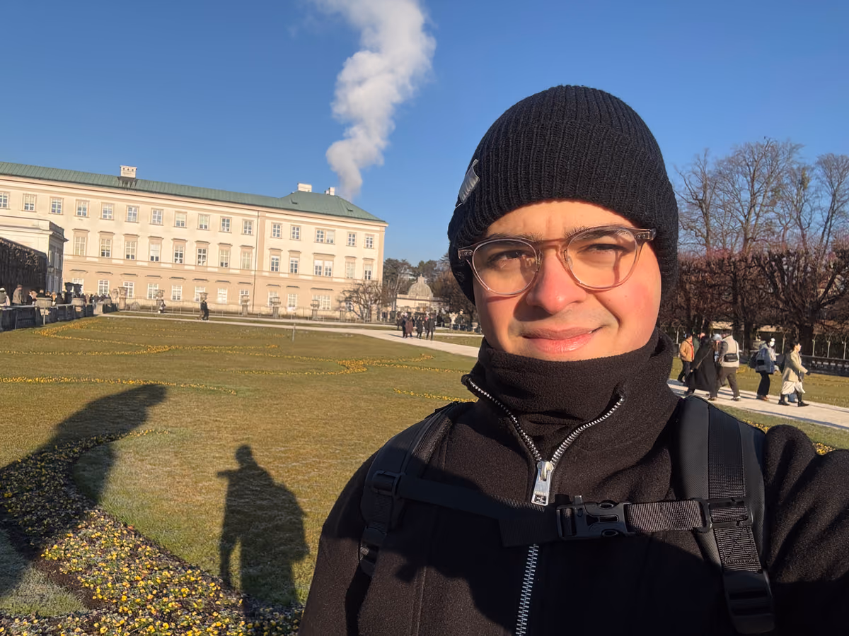 Selfie in a beanie outside Mirabell Palace in Salzburg in winter