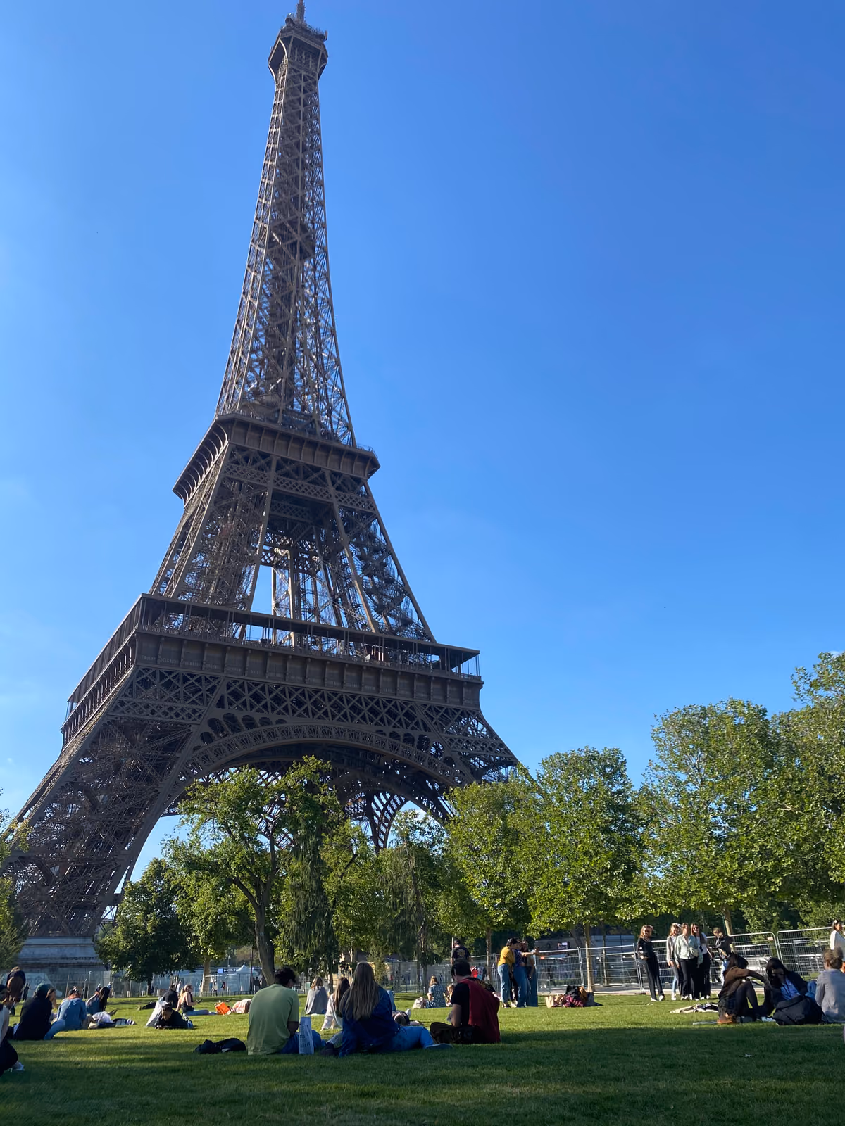 The Eiffel Tower seen from the lawns of the Champ de Mars